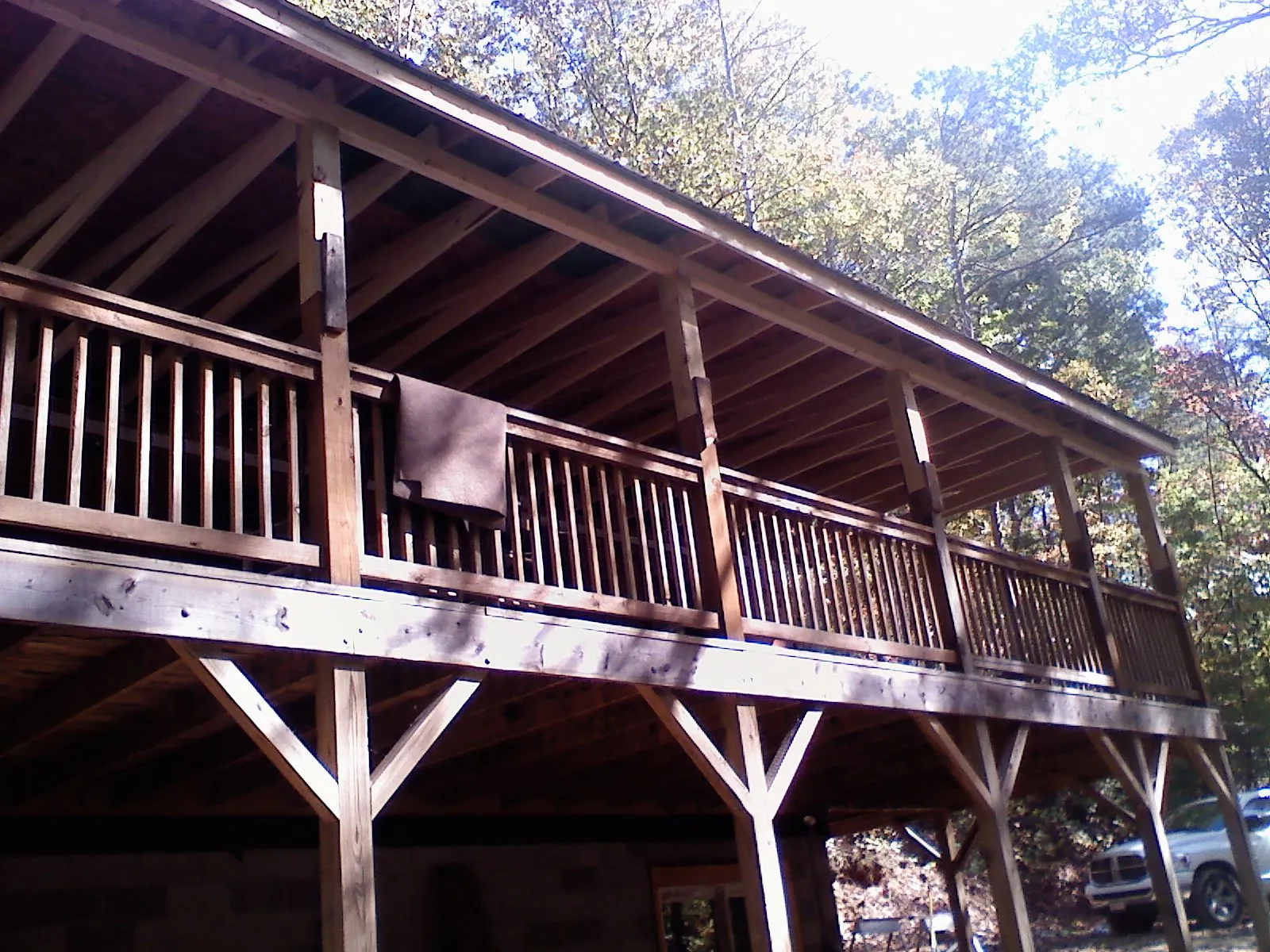 Timber framing under a new elevated porch and deck — Roof Leak Repair in Canoga Park by Roofing Brothers